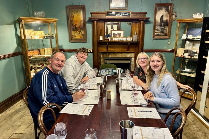 Family enjoying a VIP wine tasting inside Tyrrell's Winery tasting room, Hunter Valley, NSW
