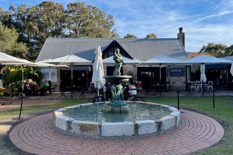 Cafe Enzo restaurant in Pokolbin Hunter Valley, charming village setting surrounded by wine country greenery